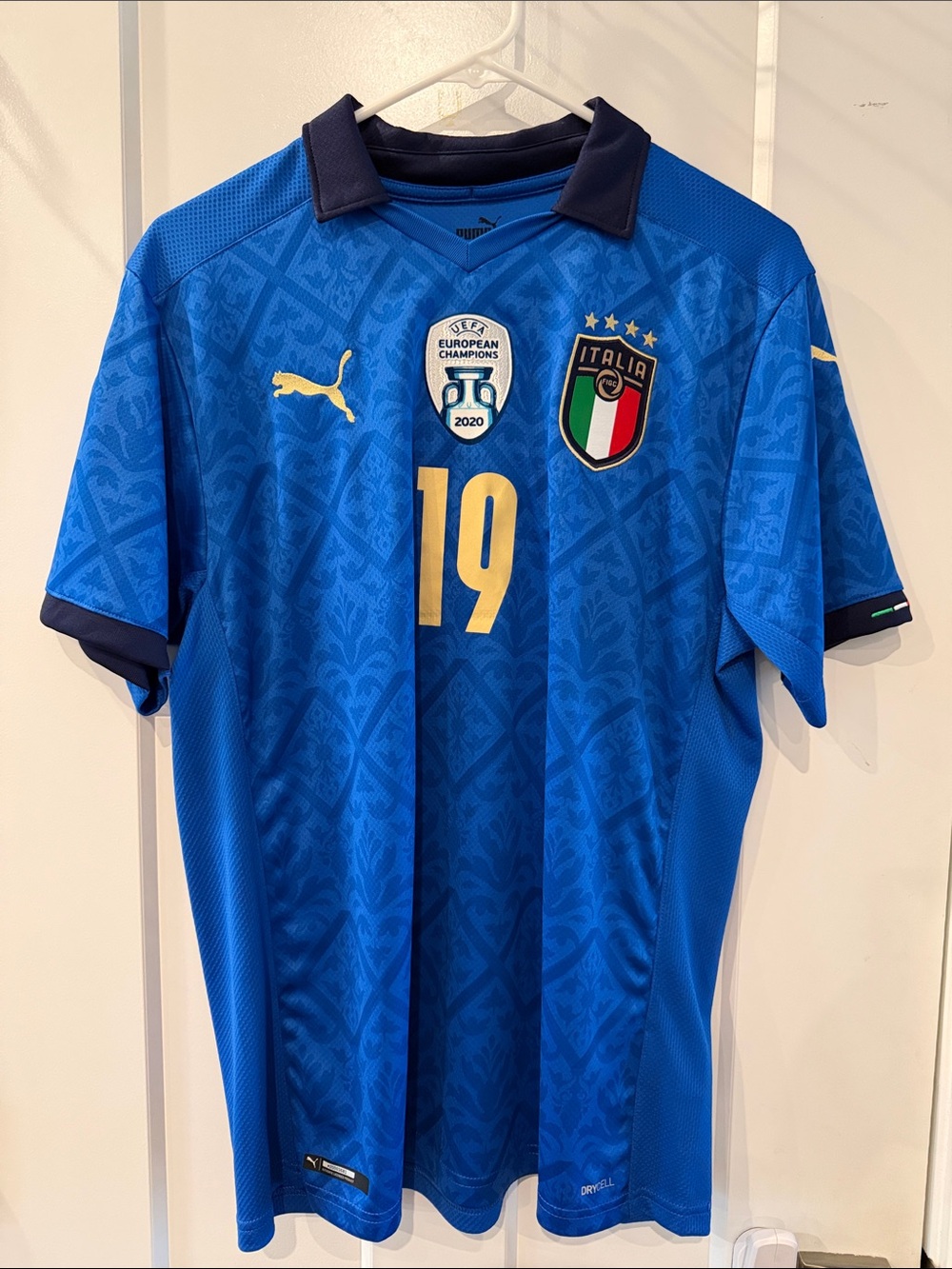 Puma Men's Euro UEFA Champions Italy Blue #19 Soccer Jersey with Gold Accents